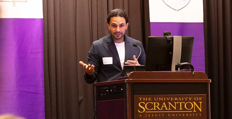 Professor Mason Ameri giving a keynote address at the Scranton University Annual Conference on Disability
