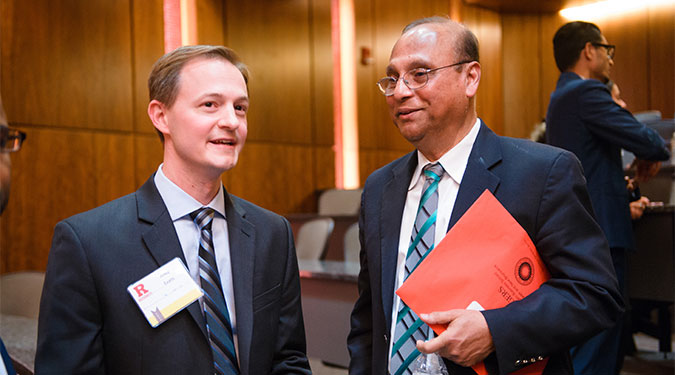 Rutgers MBA student Andrew Evans with Professor Mahmud Hassan at the competition.