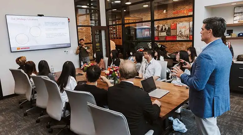 <span class='pullquote'>Tunghai University students listen to a presentation by Jeffrey Hermann, CEO of Hermann Services, Inc. </span>
