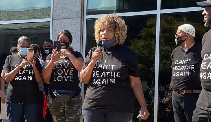 Gwen Carr leads a protest in New Brunswick.