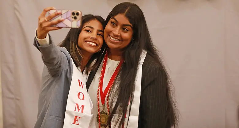 Two student members of Women BUILD take a selfie.