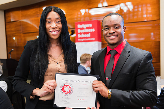 female mentor and male mentee at mentor program awards ceremony