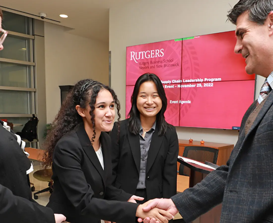 students speaking with jeffrey hermann