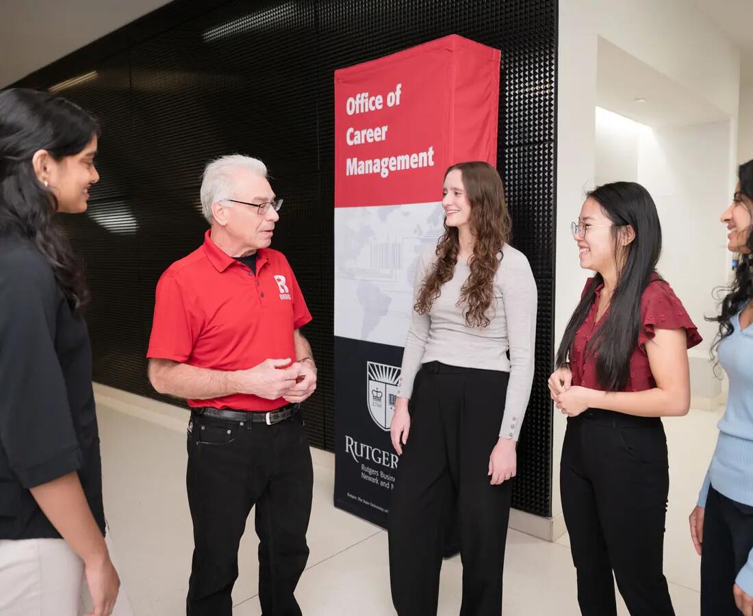 students talking with the office of career management