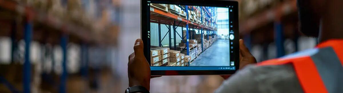 man with a tablet in warehouse