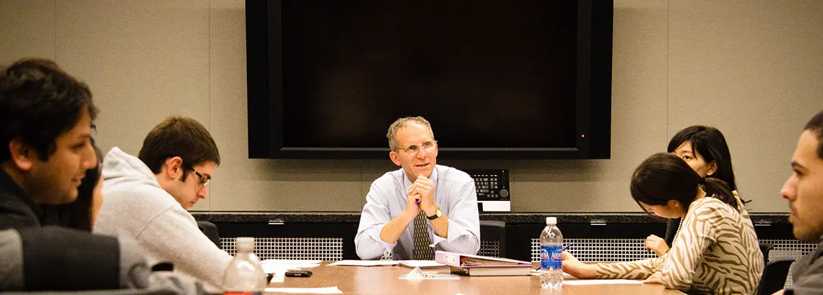 Prof. Jay Soled talks with RBS students.