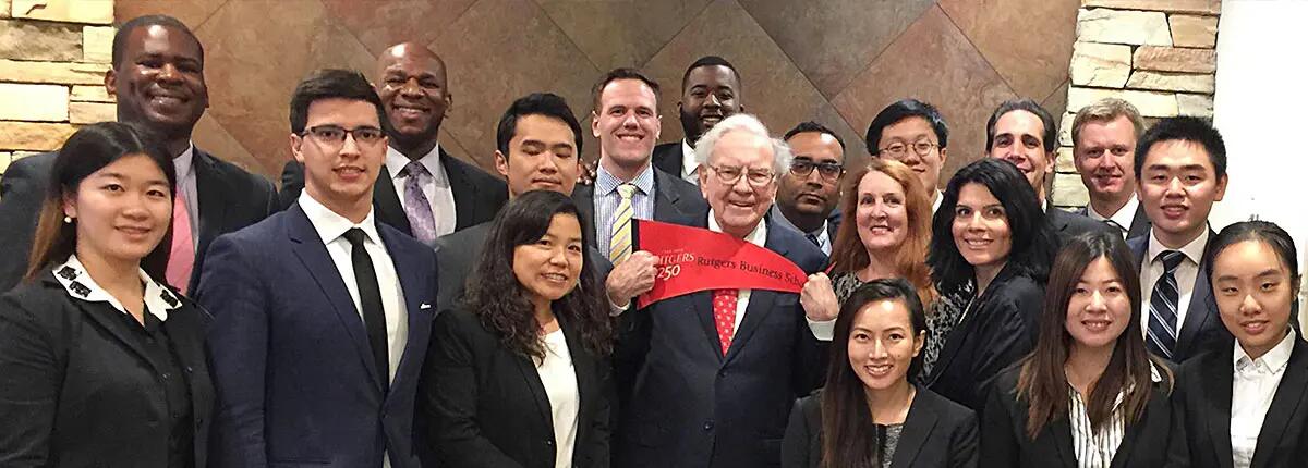 EMBA students among small group of MBAs and other graduate students meeting Warren Buffett.