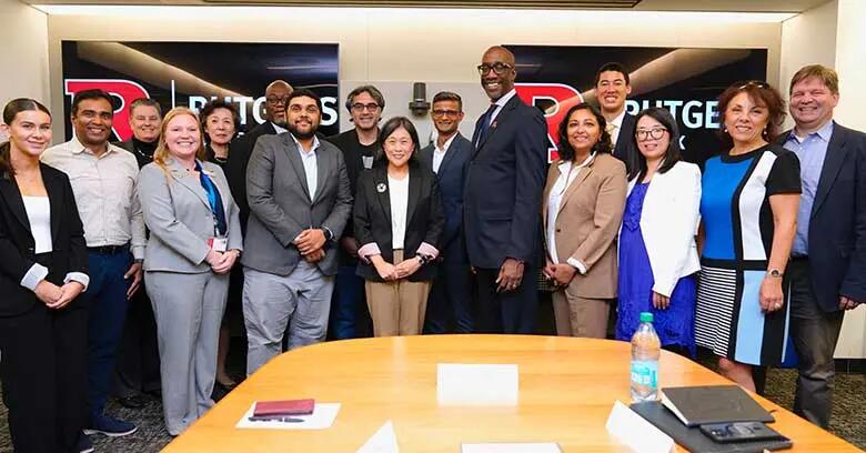 Photo of U.S. Trade Representative Katherine Tai during a visit to Rutgers Business School last fall. She is surrounded by Rutgers leaders, faculty and students.