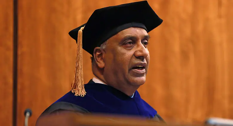 Professor Suresh Govindaraj, director of the Doctoral of Business Administration Program, wearing a cap and gown.