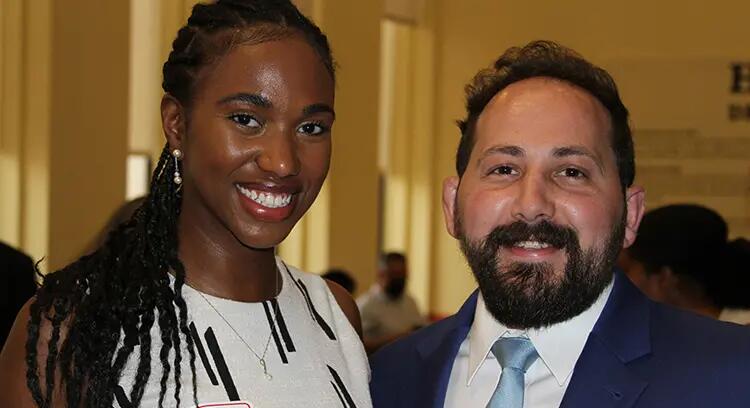 Rutgers MBA students Marsha Fils and Evan Gerbino celebrating at the MBA Awards Dinner.
