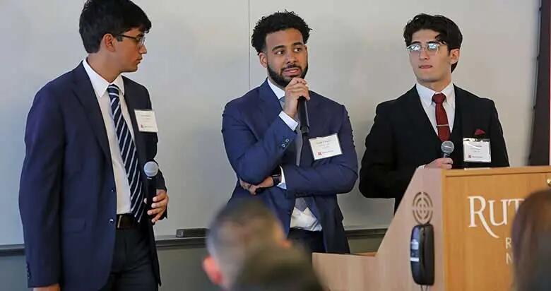 Finance students make a presentation about ALPFA Fund during the final round of Rutgers Business School's Experiential Learning Showcase.