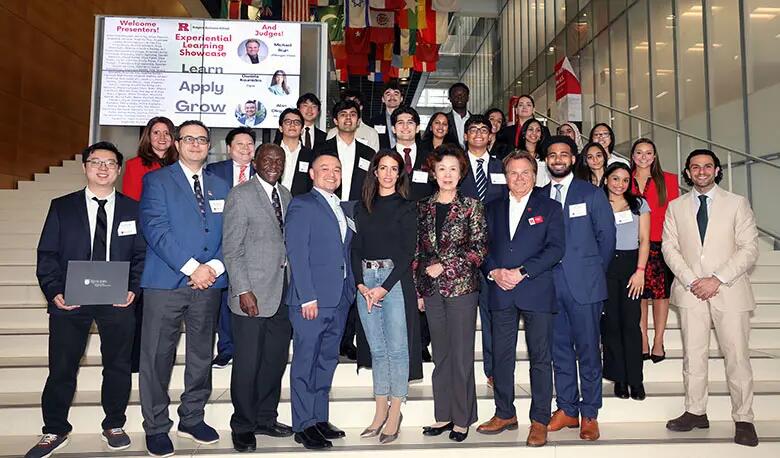 Rutgers Business School leaders and staff pose with judges and members of the six finalist teams.