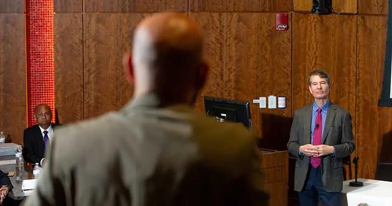 Keynote speaker Ron Cohen, former CEO of Acorda Therapeutics, answers a question from the audience at Rutgers Business School's healthcare symposium.