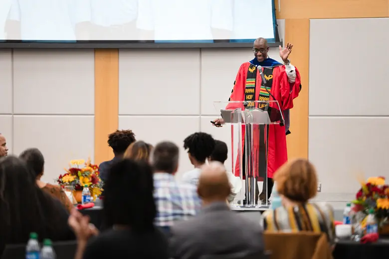 Jeffrey Robinson addresses friends, faculty, and family at his investiture ceremony for the Prudential Chair in Business.