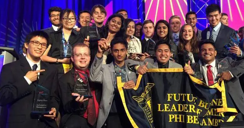 Members of Future Leaders of America-Phi Beta Lambda celebrate their awards at a national conference.