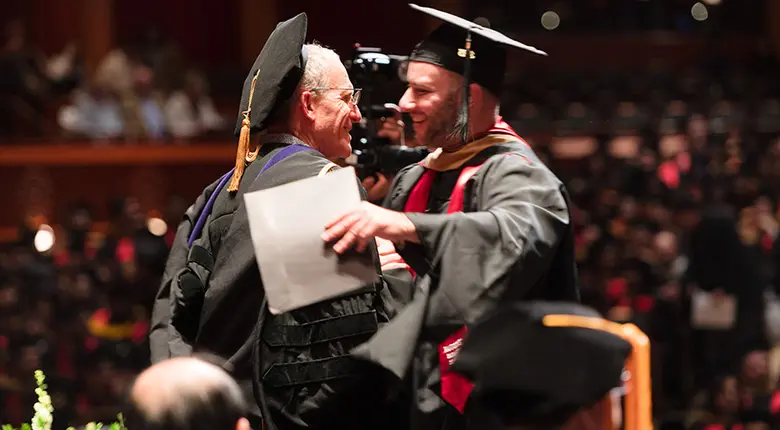 Professor Jay Soled congratulates Stefano D'Urso who completed a Master's of Accountancy in Taxation.