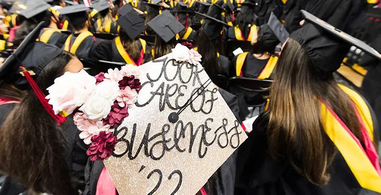 Many of the students graduating Rutgers Business School-New Brunswick donned decorated caps like this one that reads: Took care of Business.