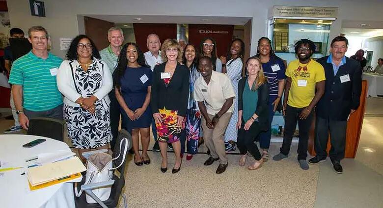 Participants of the conference pose for a group shot.