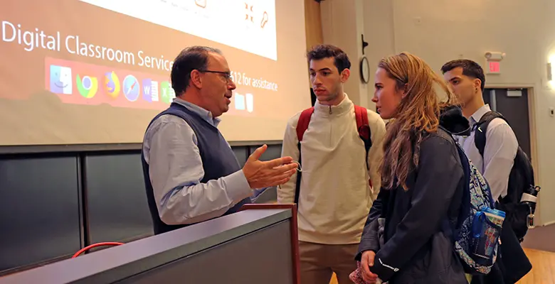 Ron Richter took questions and spoke with students after the presentation.