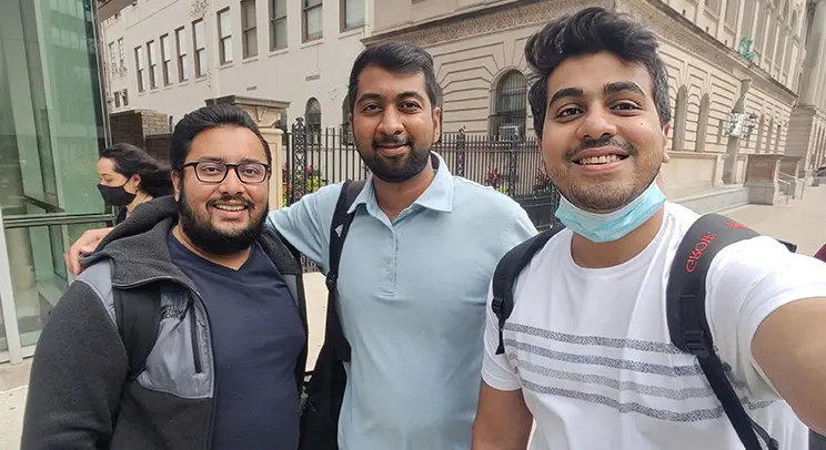 MBA student Siddharth Bal with friends on Washington Street in Newark.