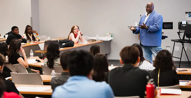 Professor Kevin Lyons lectures on sustainable urban agriculture as part of a high school summer program on supply chain management at Rutgers Business School.