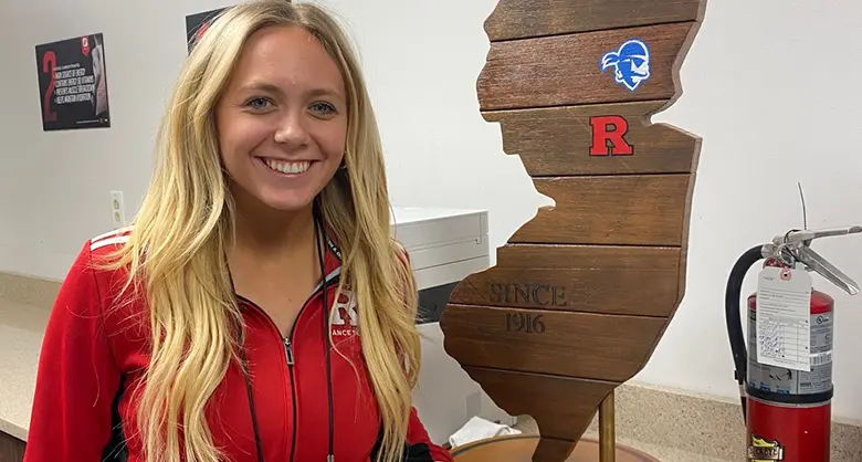 Rutgers Business School senior Cameron Bruker in her office at Rutgers University Athletics.