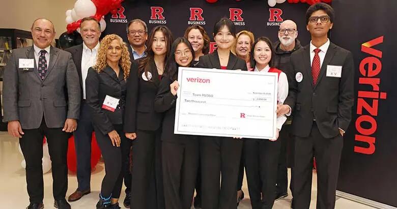 Students on Team RU360 pose with judges and mentors at the Verizon x RBS Go-to-Market Competition.