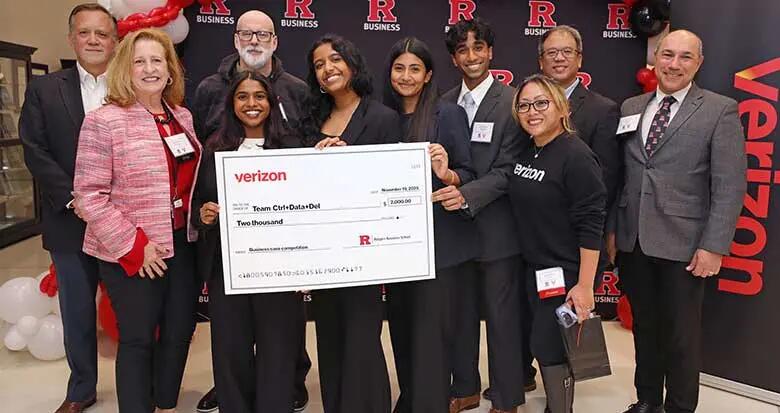 The students who made up Team Ctrl+Data+Del pose with their mentors and the judges from the Verizon x RBS Go-to-Market Competition..
