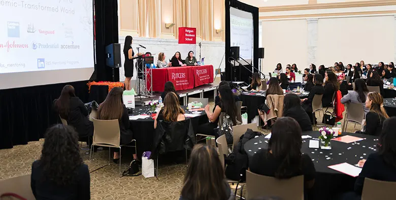 Rutgers Business School's Women BUILD mentoring program celebrates graduating students with discussion, networking.