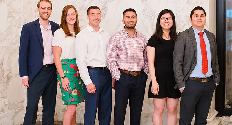 Current students in the MBA in Professional Accounting program, including Isobel Menard (second from left) and Tom Giordano (third from left).