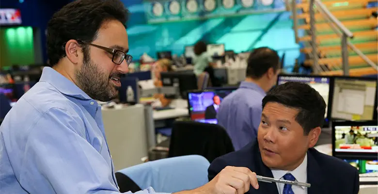 David Spiegel (left) speaks with CNBC markets reporter Dominic Chu. Photo credit: Adam Jeffrey, CNBC senior photo editor.