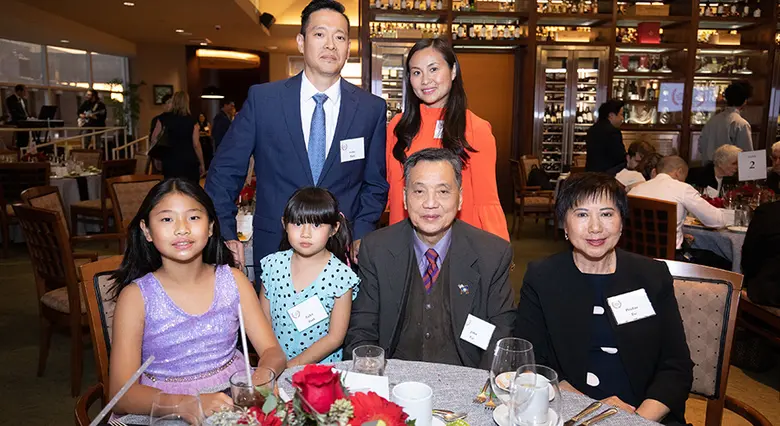 Rutgers Business School undergraduate alumna Candise Tse is shown with her family, including her parents.