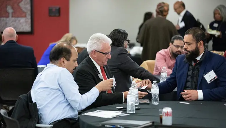 James King, senior director of the Career Management Office, making connections with attendees.