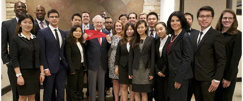 Professor John Longo and Rutgers Business School students with Warren Buffett