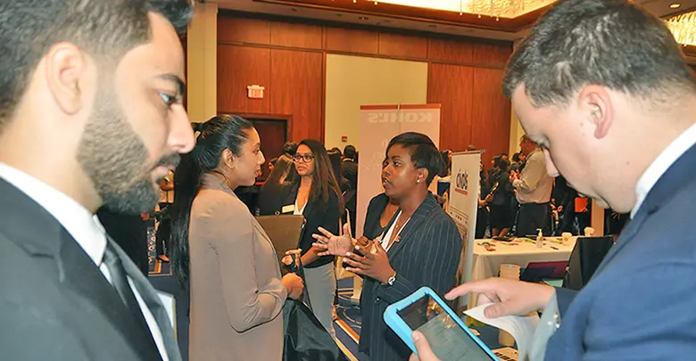 Rutgers Business School students navigated among 93 employers set up inside the Hyatt Regency Hotel in New Brunswick.