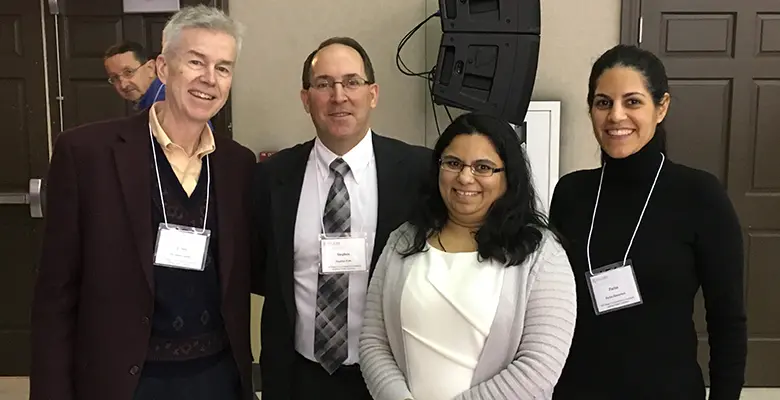 Professor Jim Smith, Stephen Eells, and two of Smith’s students: Shrushti Trivedi and Parisa Hamzetash.