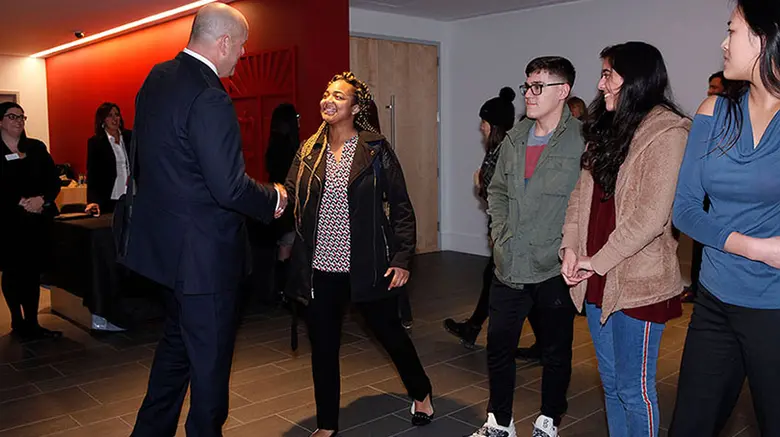 Rutgers Business School students meet Harvey Schwartz, a Rutgers alumnus who retired last year from Goldman Sachs Group.