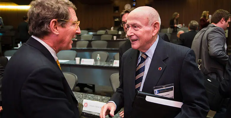 Cole Werble and Irwin Lerner face each other in greeting