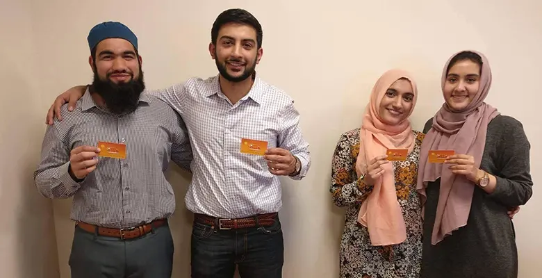 Seniors Hasan Usmani, Moneeb Mian, Najeeha  "Gia" Farooqi, and alumna Hanaa Lakhani.