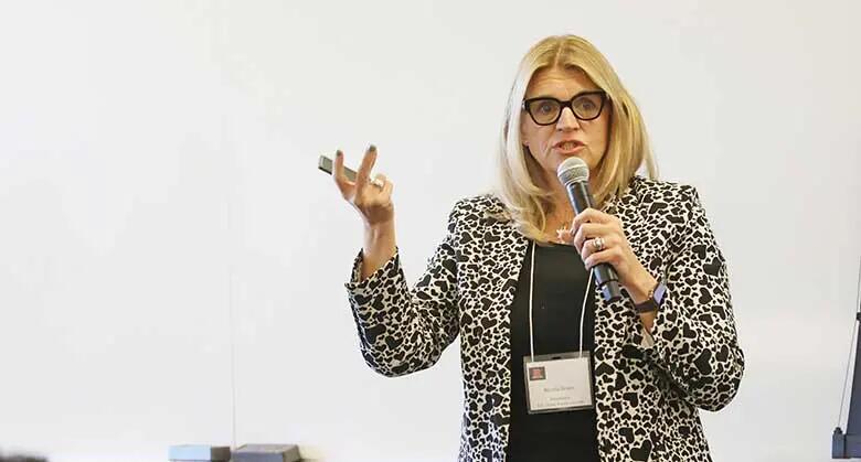 Mastercard's Senior Vice President for Global Brand and Advertising Nicola Grant presents at Rutgers Business School's annual marketing summit.