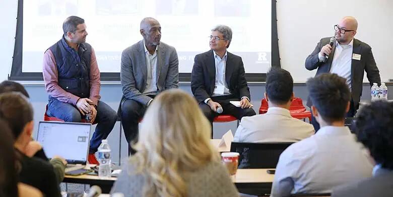 Marketing professor Chris Ribeiro moderates a panel of industry professionals