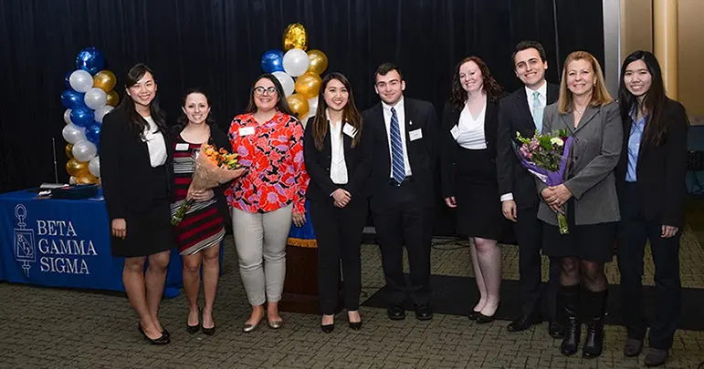 Monica Song with fellow members of Beta Gamma Sigma.