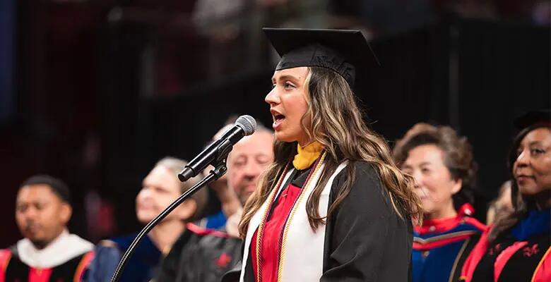 Marketing major Natalie Ligotino sang an impressive acapella national anthem to thunderous applause.