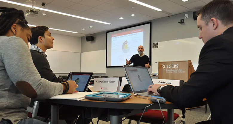 Rutgers Part-time MBA alumnus Ralph Ferrales teaches a session in the Rutgers Business School's Executive Education Mini-MBA: Business Management for Military and Veterans.