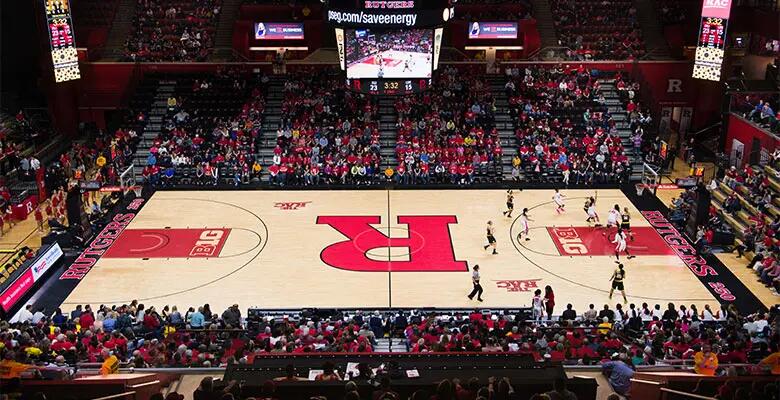 A wide view of the basketball game in progress