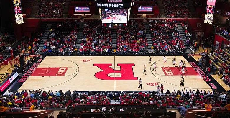 A wide view of the basketball game in progress