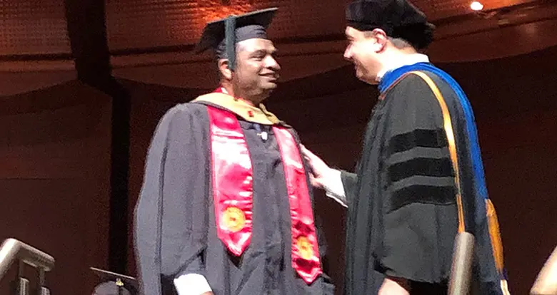 Rutgers EMBA Rojo Mathai at the convocation ceremony in May.