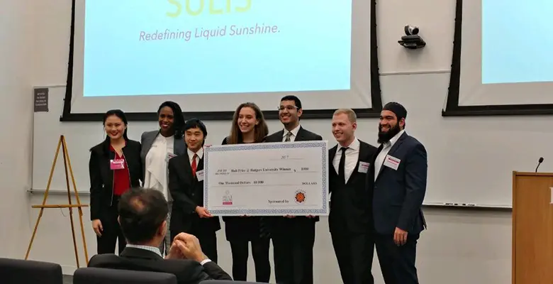 From left: Sophia Zhou, Hult at Rutgers Campus Director; Suna Lumeh, Scientist and STEM Outreach Advocate, Johnson & Johnson; Yuki Osumi; Sarah Pomeranz; Anurag Modak; Ari Mendelow, and Hasan Usmani, Founder & COO, Roshni Rides (Hult Prize 2017 Global Winner).