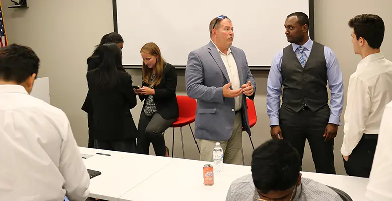 Panelists (from left) Kate Reilly, Jerry Wade, and Jatil Kodati spoke with the students, answered questions, and even connected on LinkedIn.