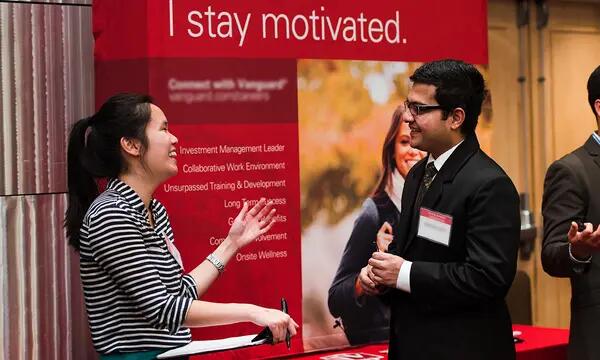 Student talking with recruiter